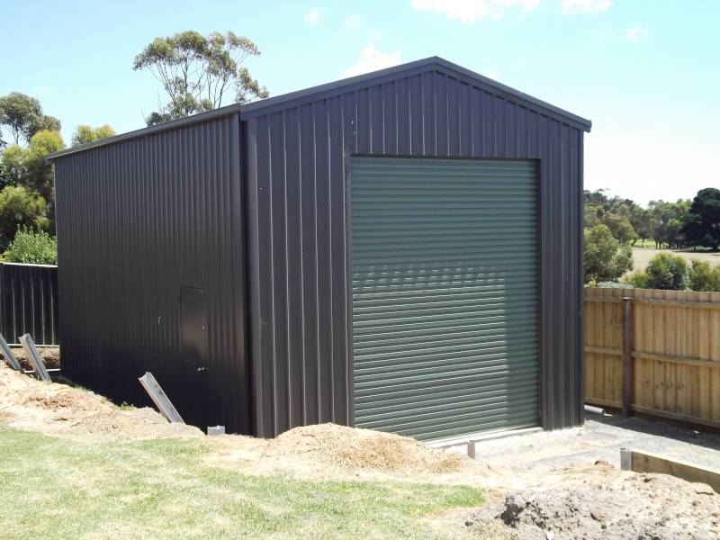 shed with green roller door