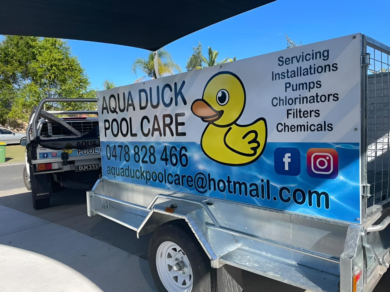 A Trailer For Aqua Duck Pool Care Is Parked On The Side Of The Road — Aqua Duck Pool Care In Landsborough, QLD