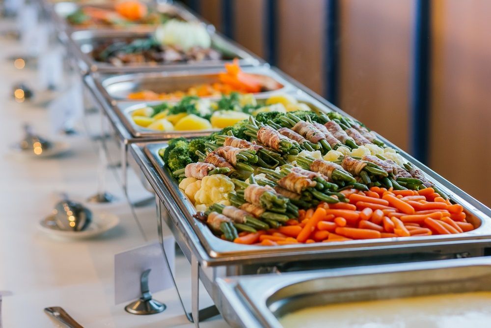 A Long Buffet Line Filled With Lots Of Different Types Of Food — Grafton Hire In South Grafton, NSW
