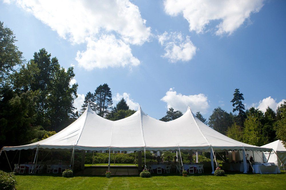 White Marquee Set Up in a Field on a Sunny Day - Equipment Hire in Grafton NSW