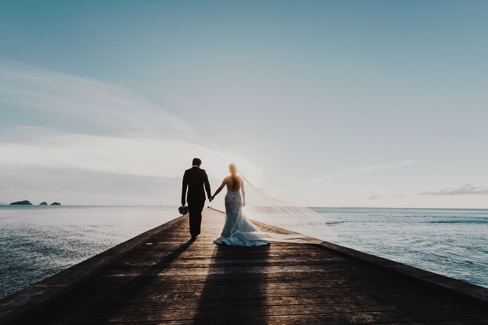 newlywed couple on a beach