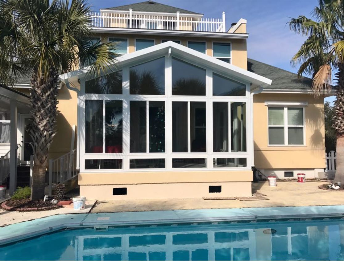 Pool Screened Enclosure Installation — Modern House with Pool in Milton, FL