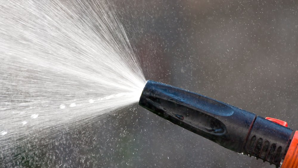 pressure washer nozzle spraying water