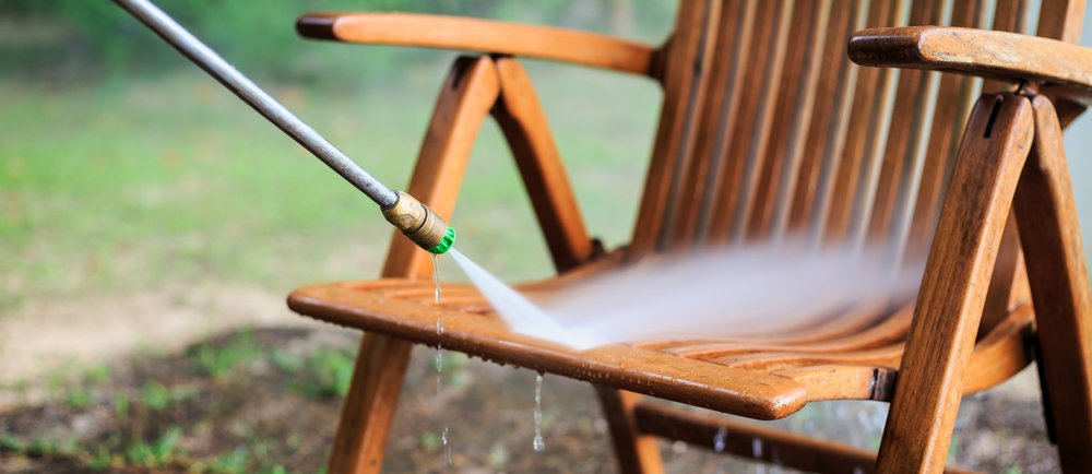 Pressure Washing a wooden outdoor chair