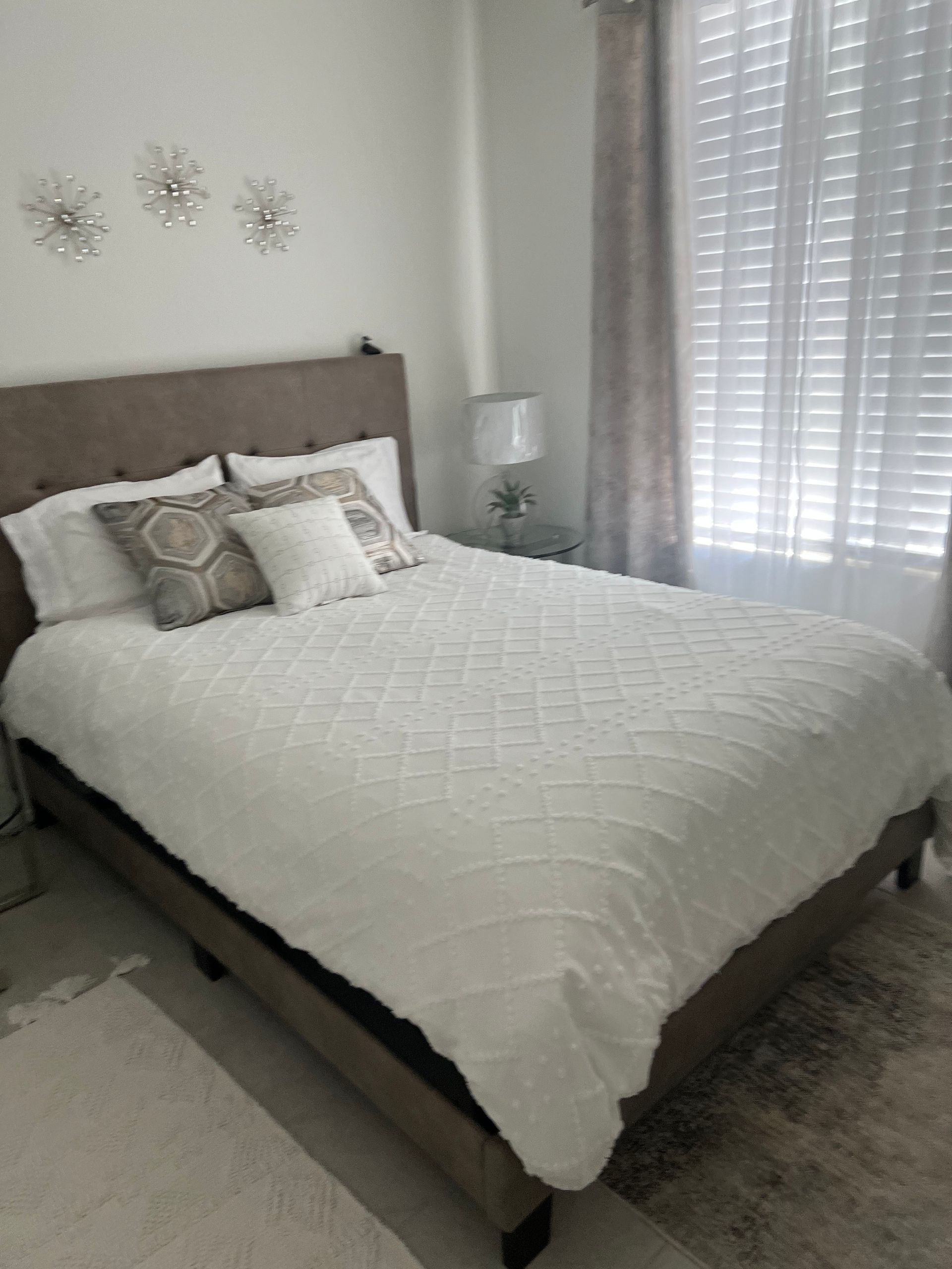 A bedroom with a  perfect and clean bed, looks invite to have a perfect night. in Coachella Valley, CA