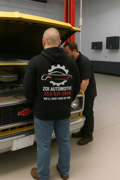 Technicians Working on Vehicle