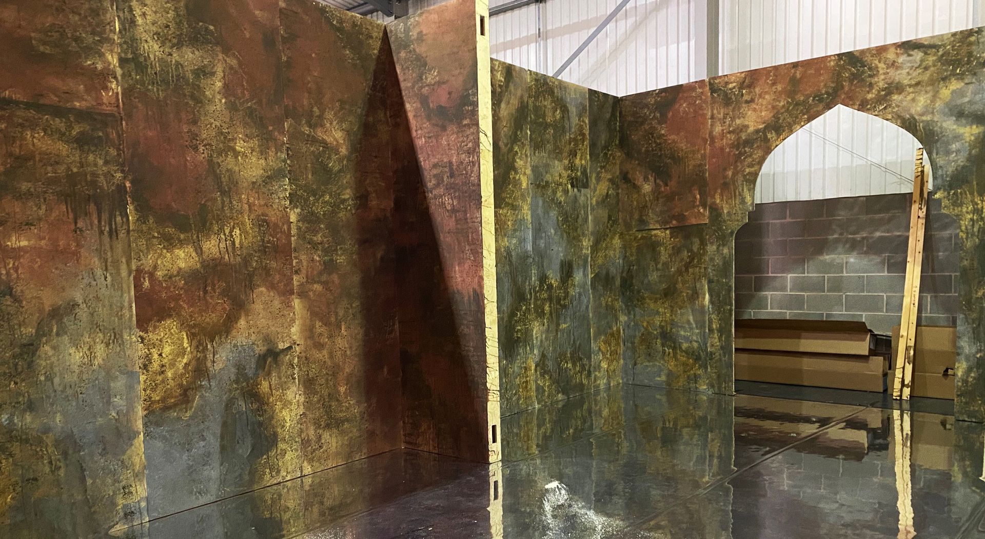 scenic painting of rusted medal containers