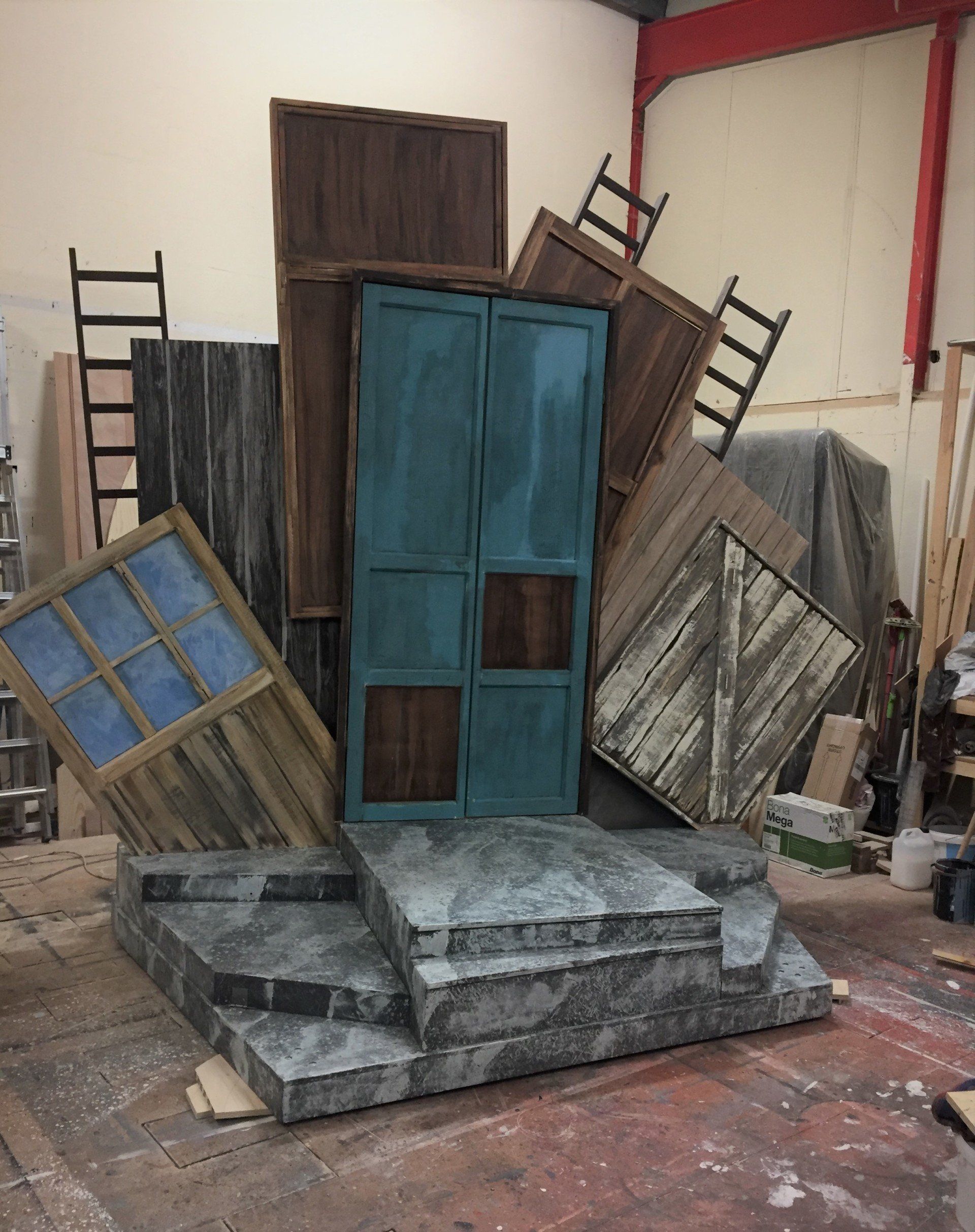 stage scenery revolve with doors on different levels