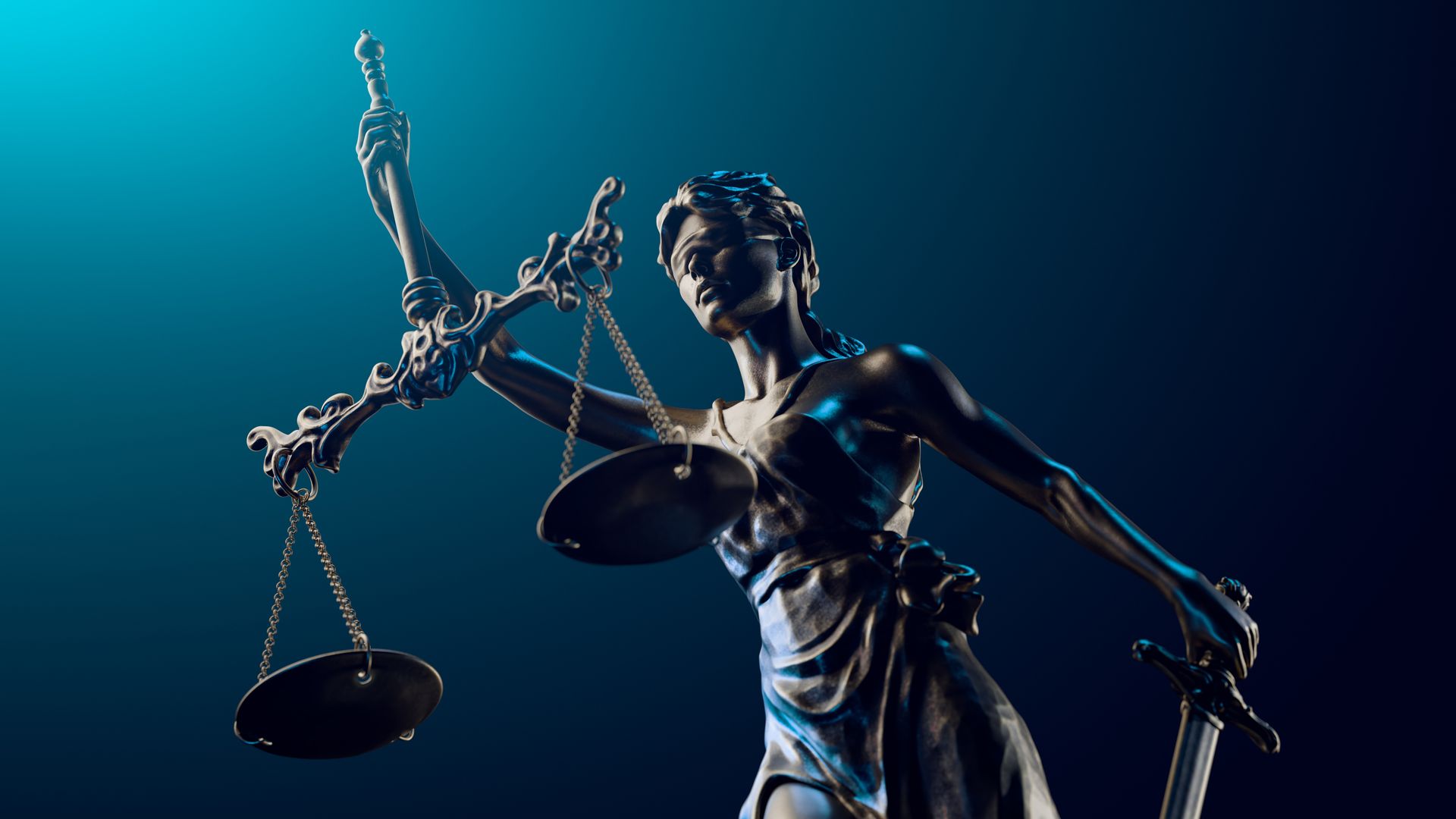 Statue of Lady Justice holding scales and sword, set against a blue background.
