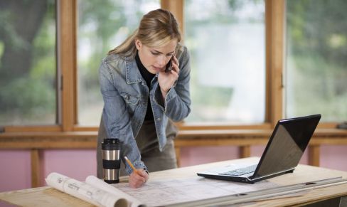 Woman contacts a crane hire company in Goulburn