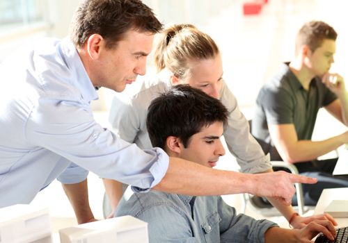 Professional trainer guiding the student 