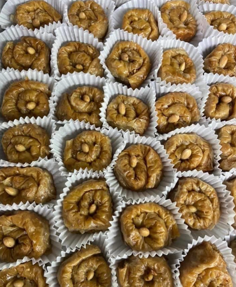 A bunch of cupcakes with nuts in them