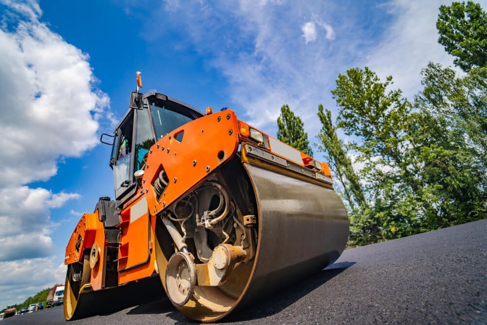 Asphalt Paver in Operation — Civil Contractors in Coopernook, NSW