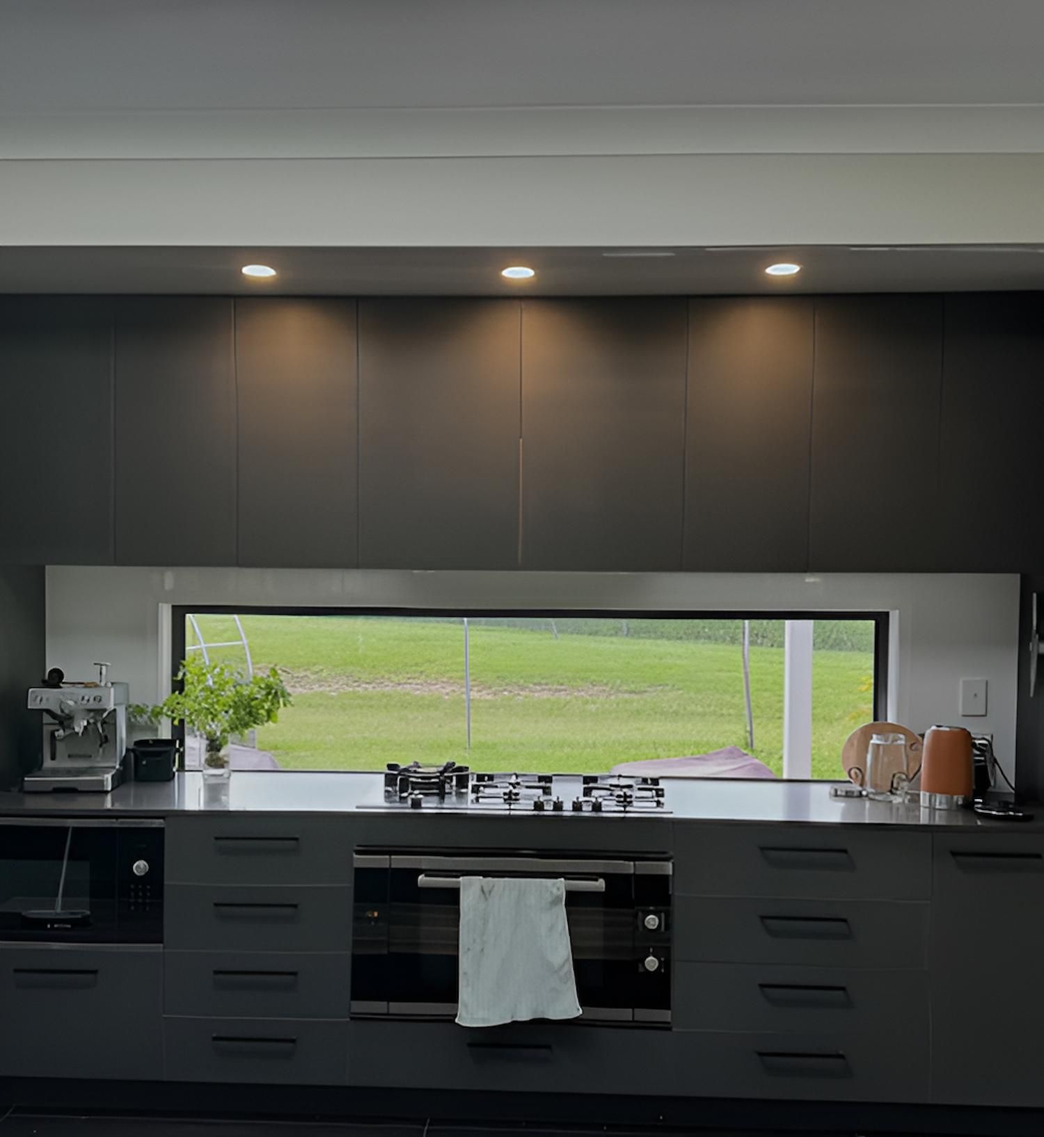 A Strip Of Lights Are On Above A Kitchen — Tec Electrical & Air In Rothwell, QLD