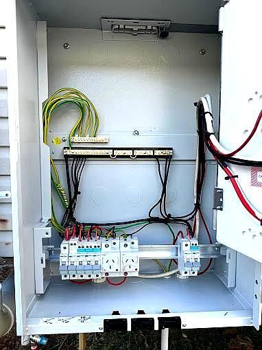 A Motherboard Is Open And Being Worked On — Tec Electrical & Air In Caboolture, QLD