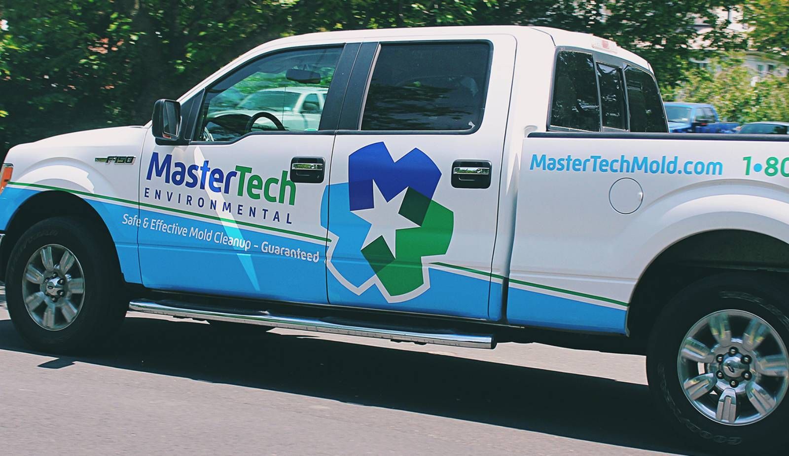 A Mastertech franchise owner receiving hands-on training, highlighting the support system that comes with the franchise model.