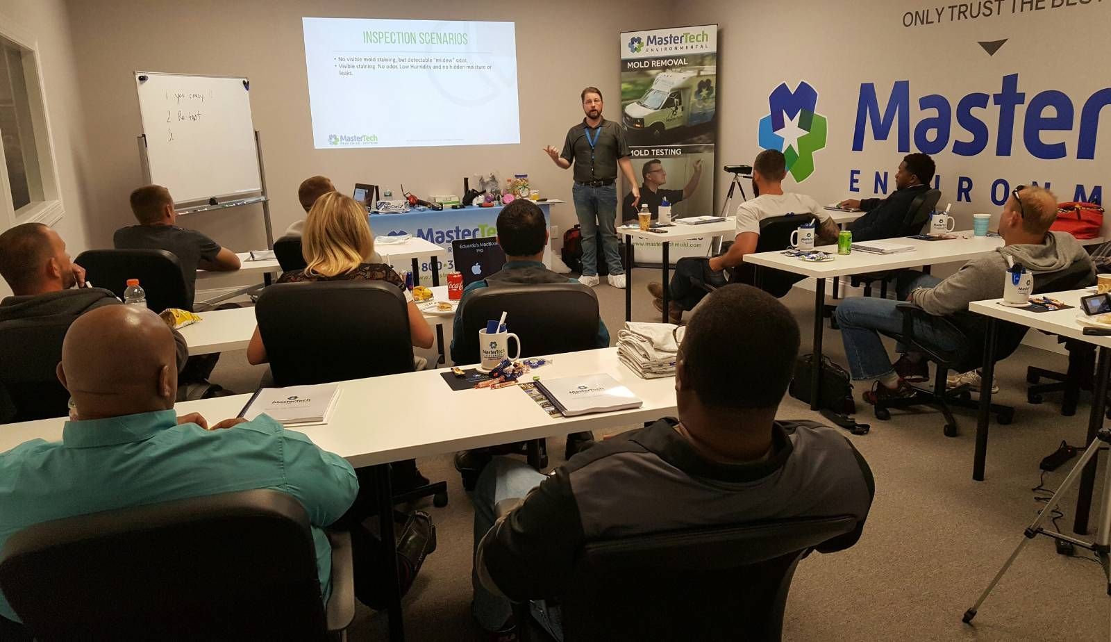 Mastertech franchisees participating in an in-depth training session on restoration techniques and business operations.