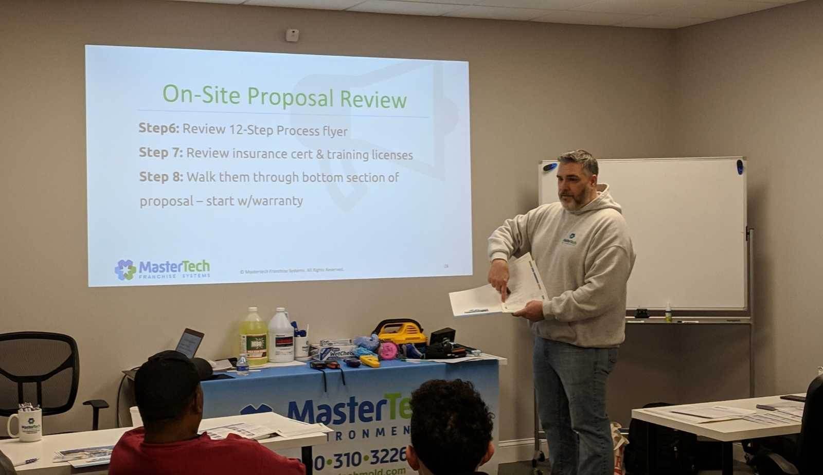 New Mastertech franchisees participating in hands-on training designed to help first-time business owners gain confidence and real-world knowledge.
