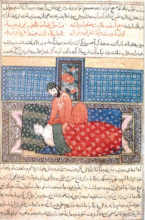 A physician takes the pulse of a young girl.