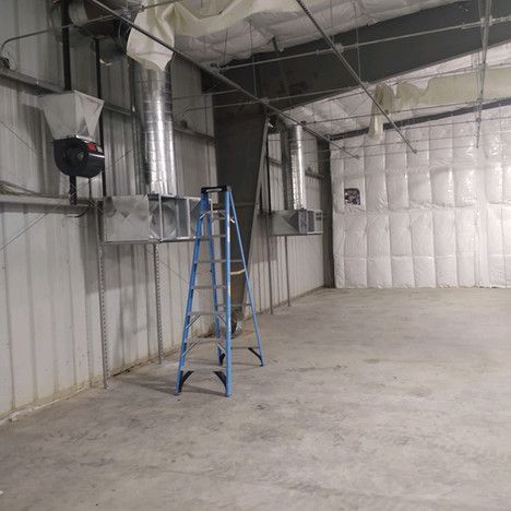 There is a ladder in the middle of the room.