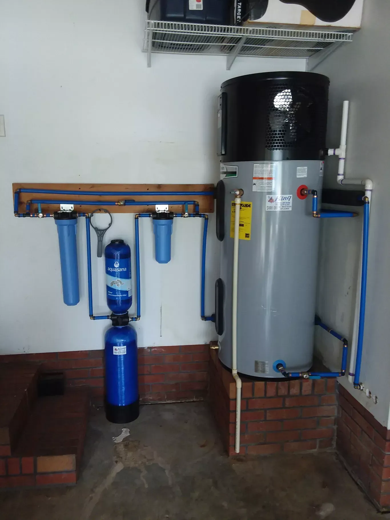 A water heater with a filter attached to it