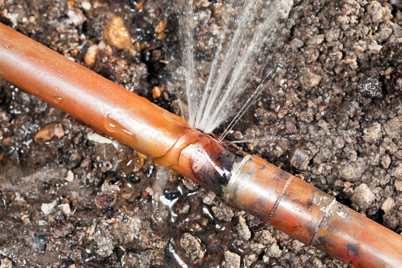Copper pipe, split and leaking water.