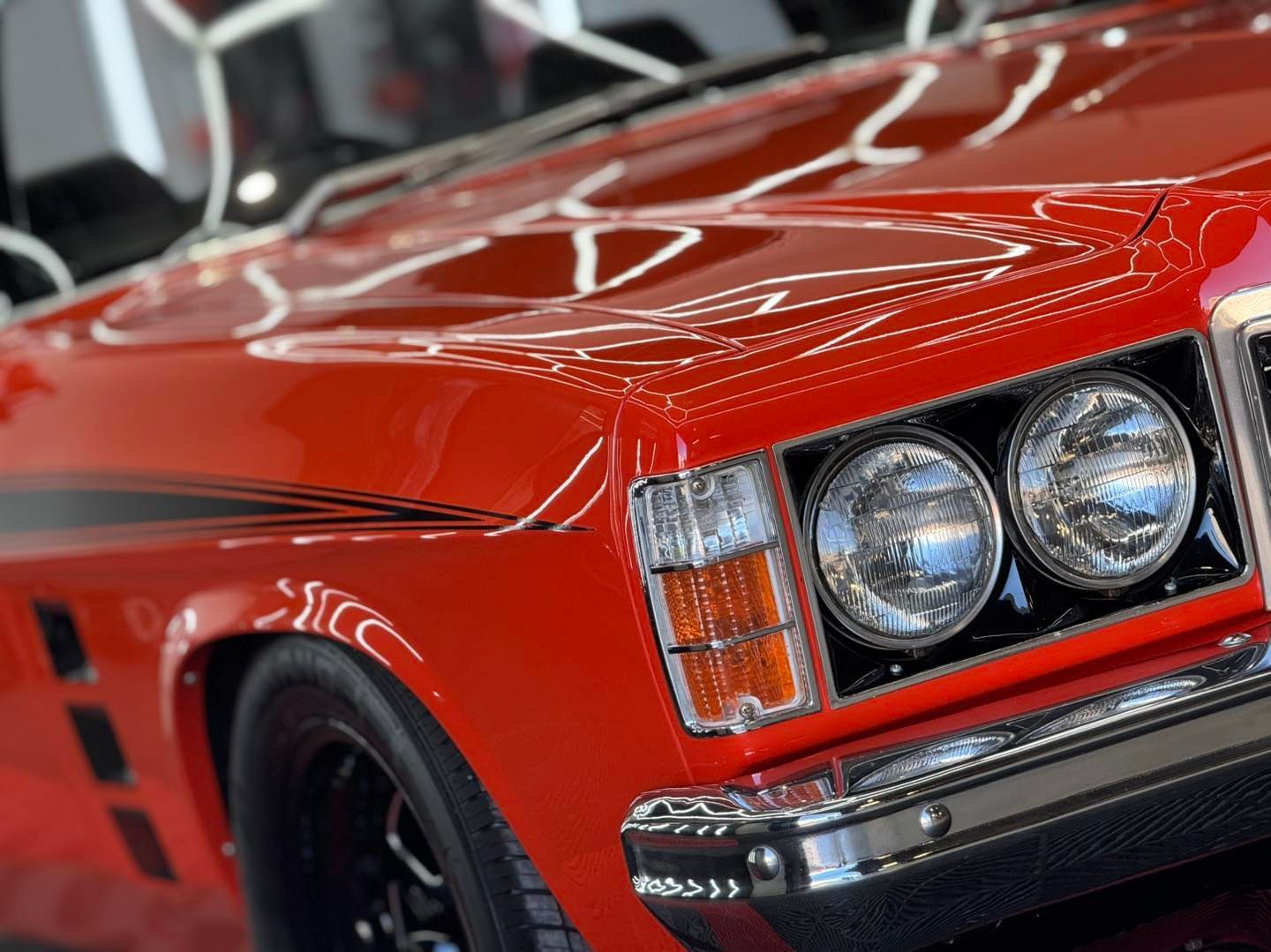 A Group Of Bottles Of Cleaning Products Are Lined Up On A Table — The Works Auto Salon In East Bendigo, VIC