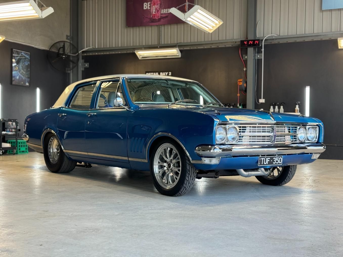 A Blue Car Is Parked In A Garage — The Works Auto Salon In East Bendigo, VIC