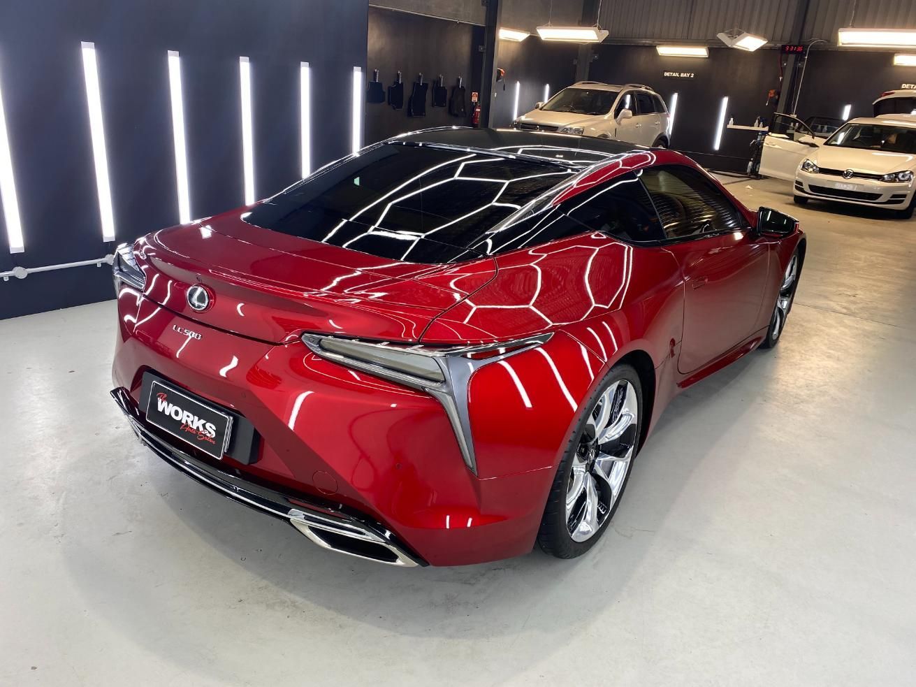 A Red Sports Car Is Parked In A Garage — The Works Auto Salon In East Bendigo, VIC