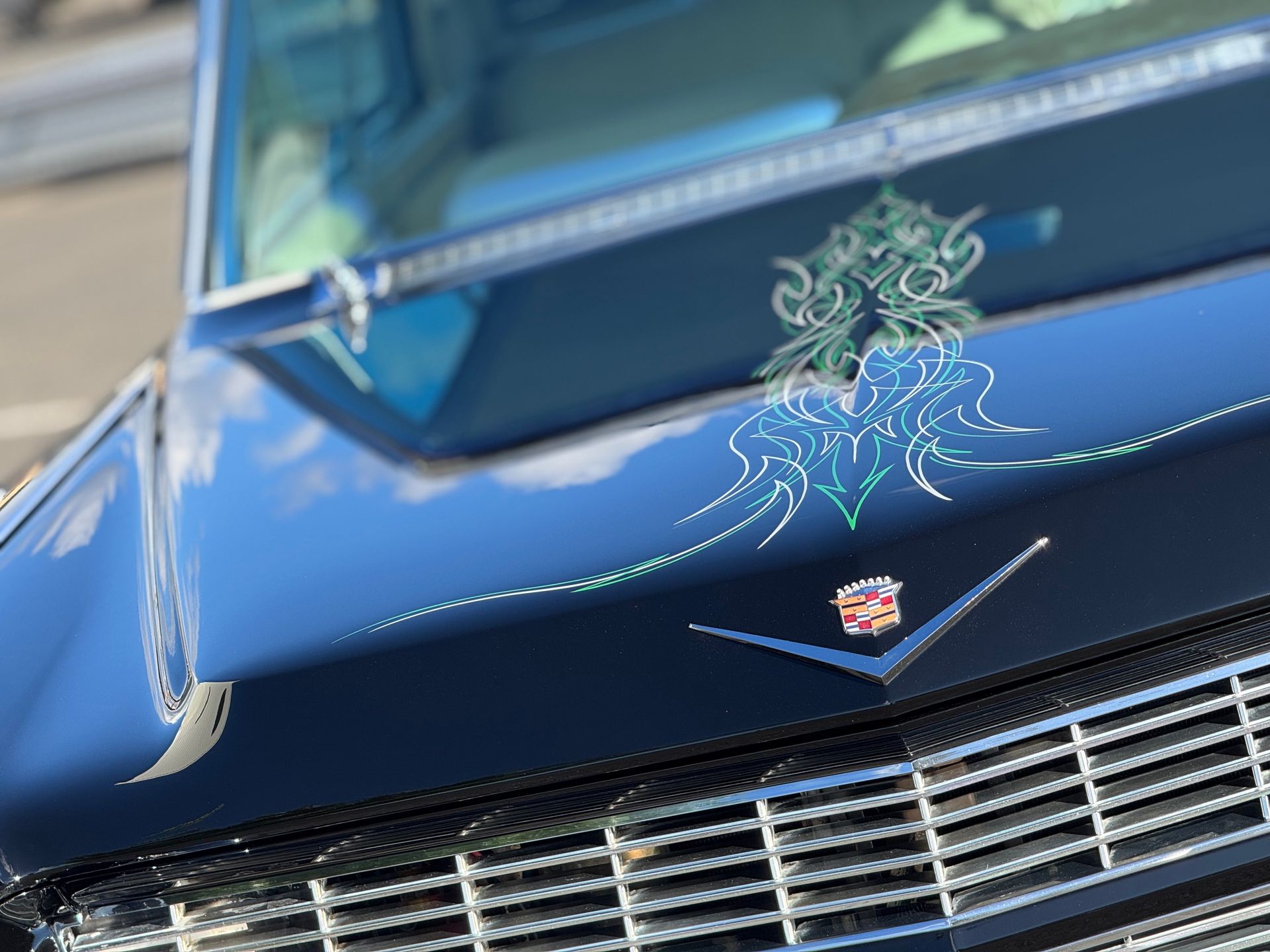 A Person Is Polishing A Yellow Car With A Machine — The Works Auto Salon In East Bendigo, VIC