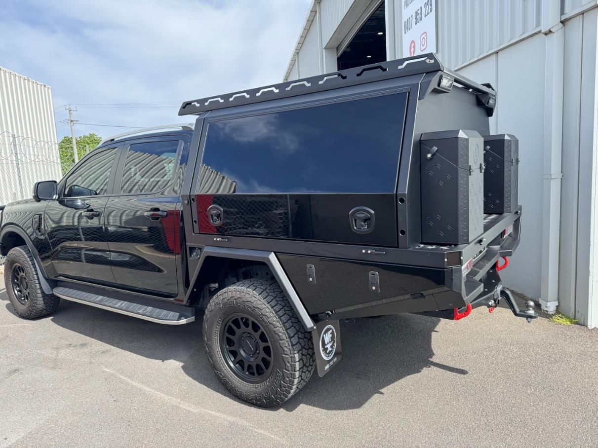A Black Truck With A Canopy Is Parked In Front Of A Building — The Works Auto Salon In East Bendigo, VIC