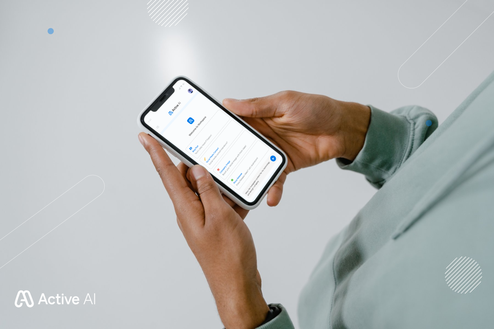 Person holding a smartphone displaying an app interface. The setting is a bright, minimalist space.