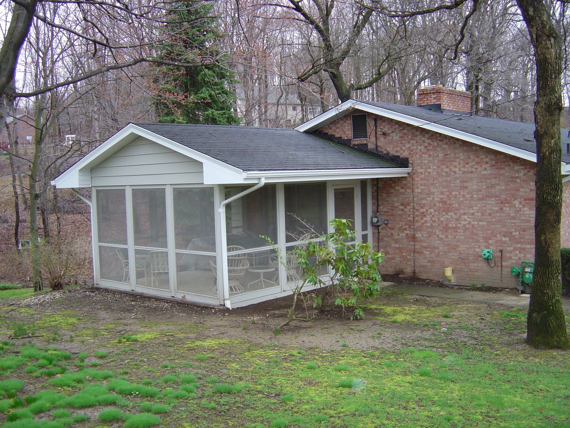 before picture of an old screened porch