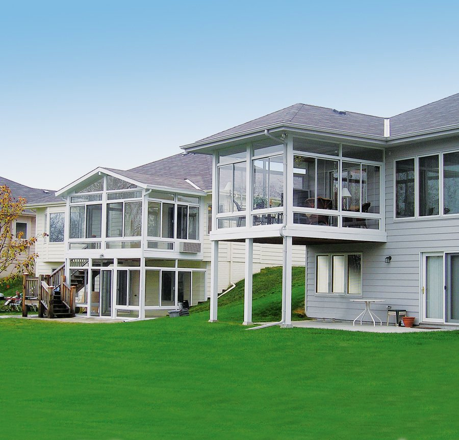 A large white house with a lot of windows