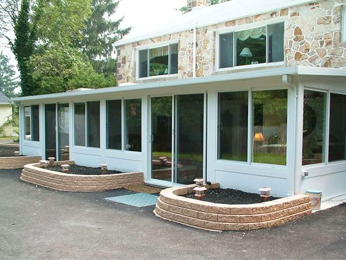 A large white house with a lot of windows