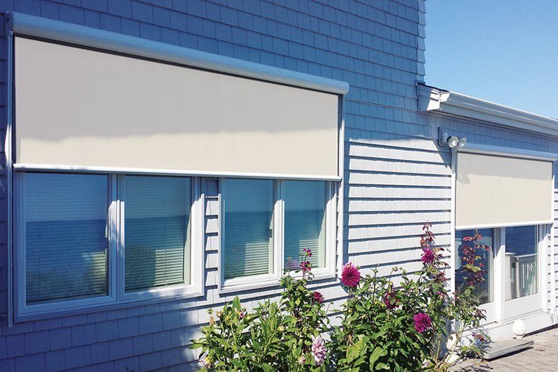 A house with a white blind on the windows
