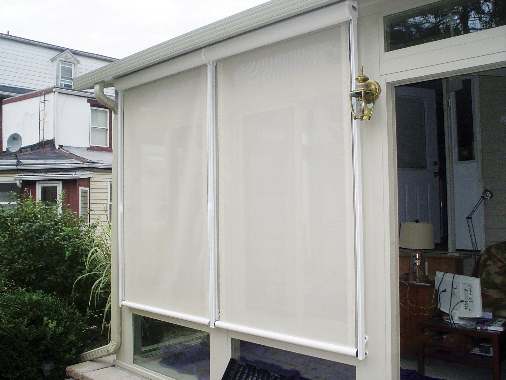 A white window with a white blind on it