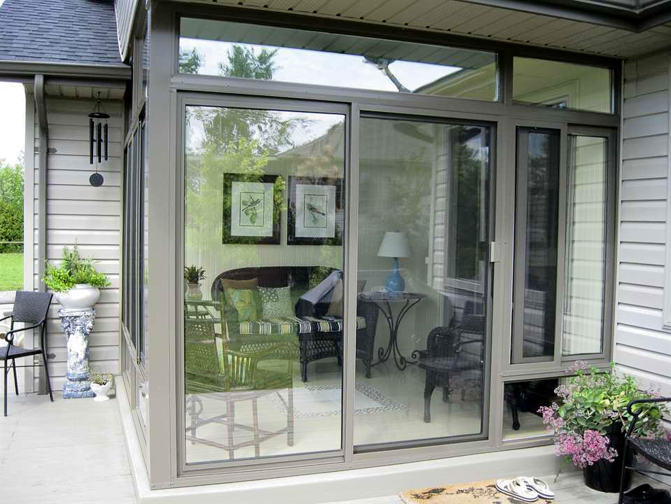 A sliding glass door leads to a living room