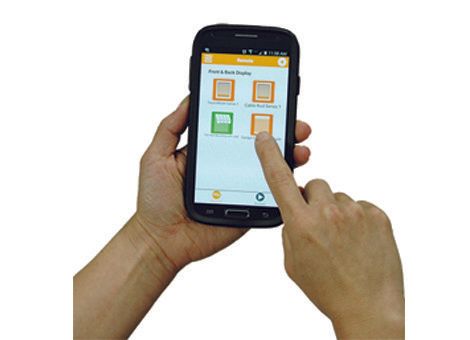 A person is holding a cell phone with a home screen on it