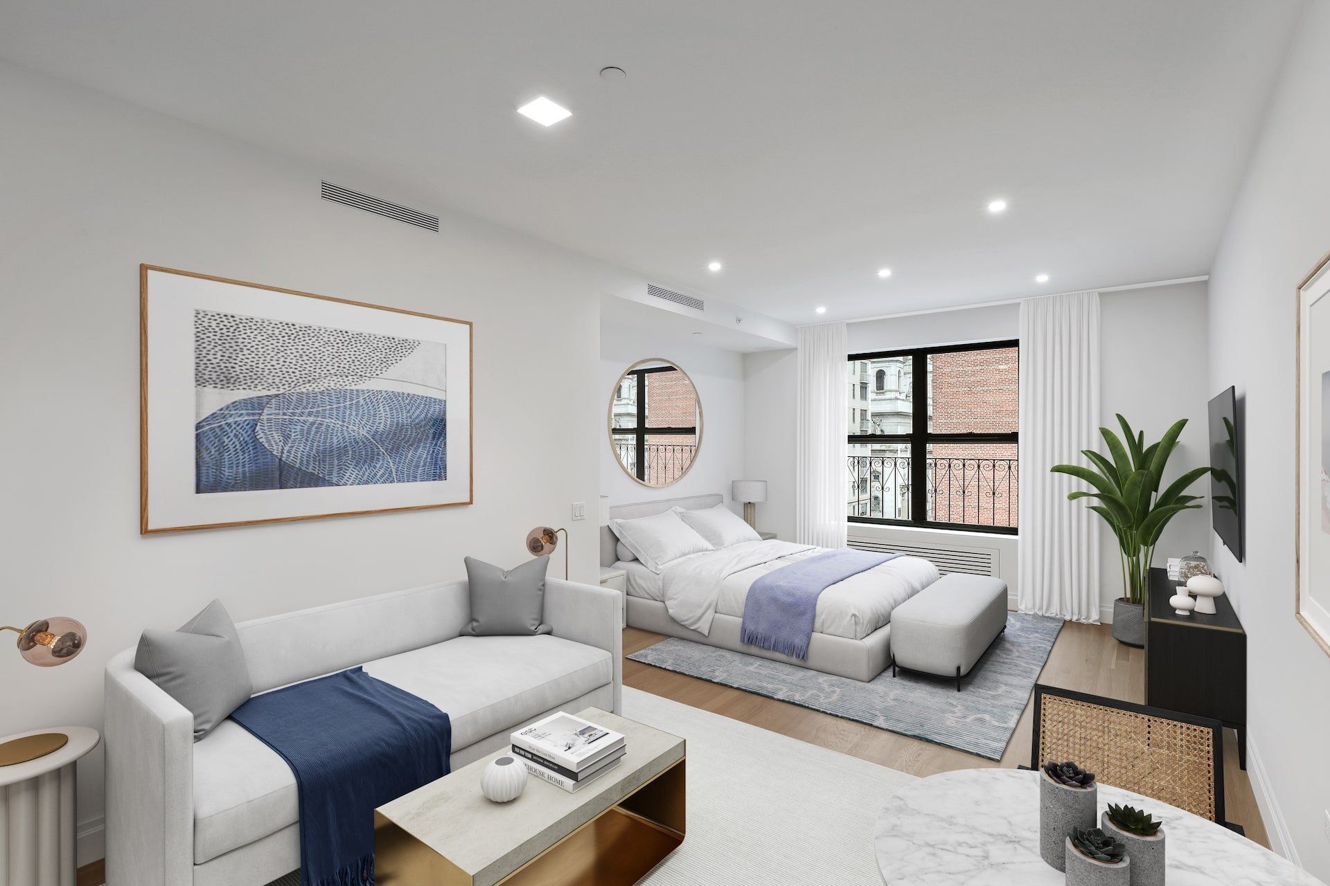 Studio space with couch and bed