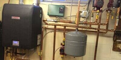 Machine with Golden Pipes - Heating and Air Conditioning Service in Hugo MN