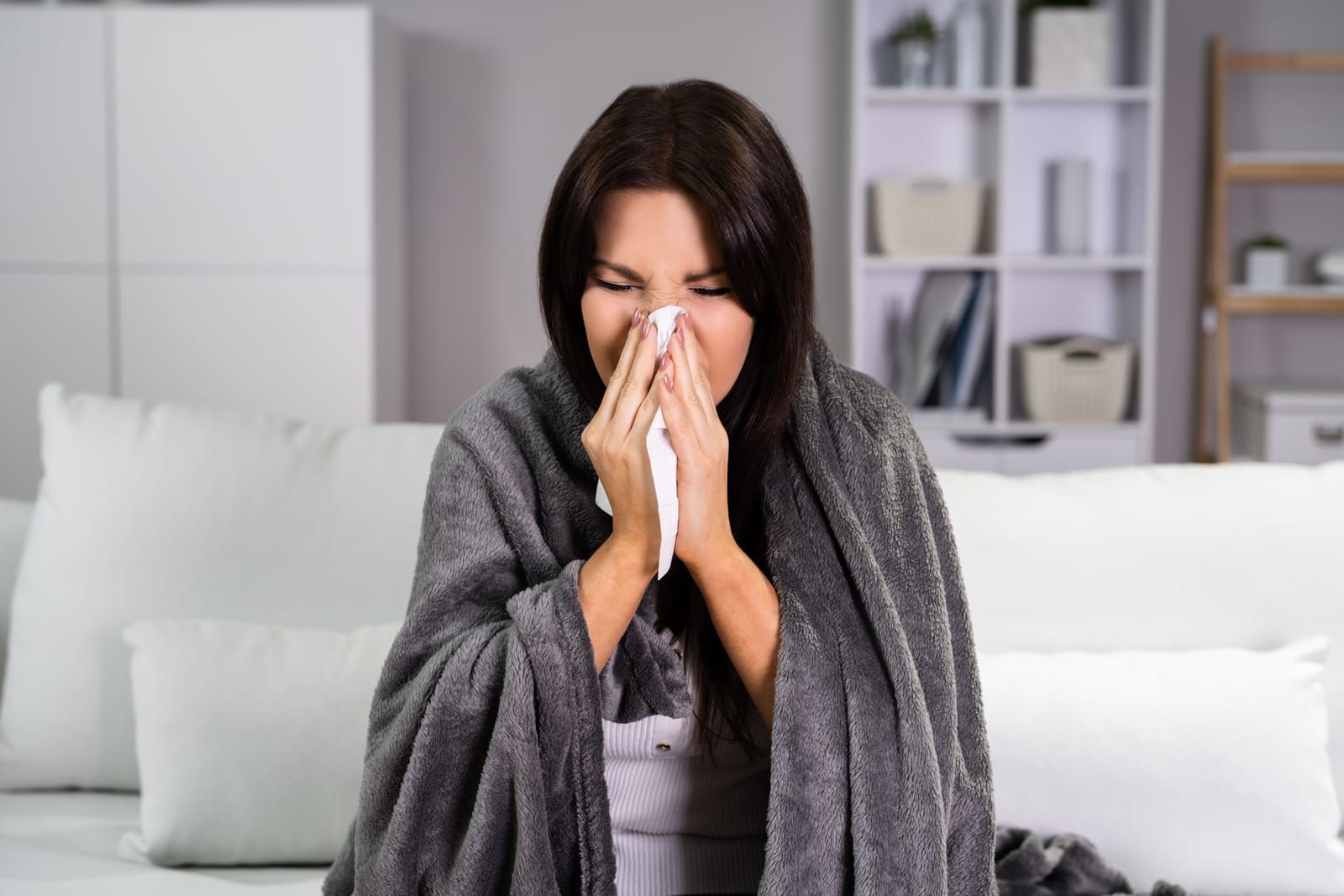 Woman With Allergic Sneeze And Rhinitis Infection