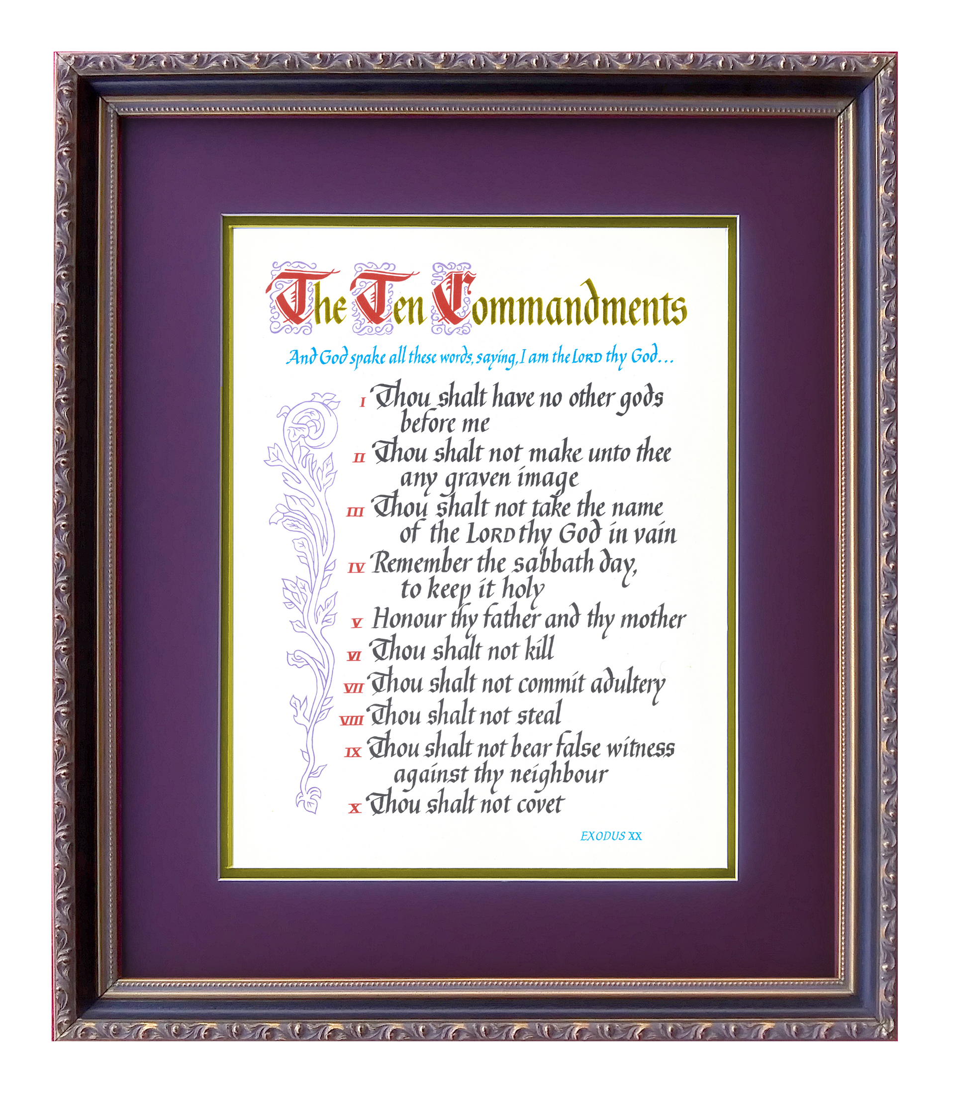 A framed picture of the ten commandments in a purple frame