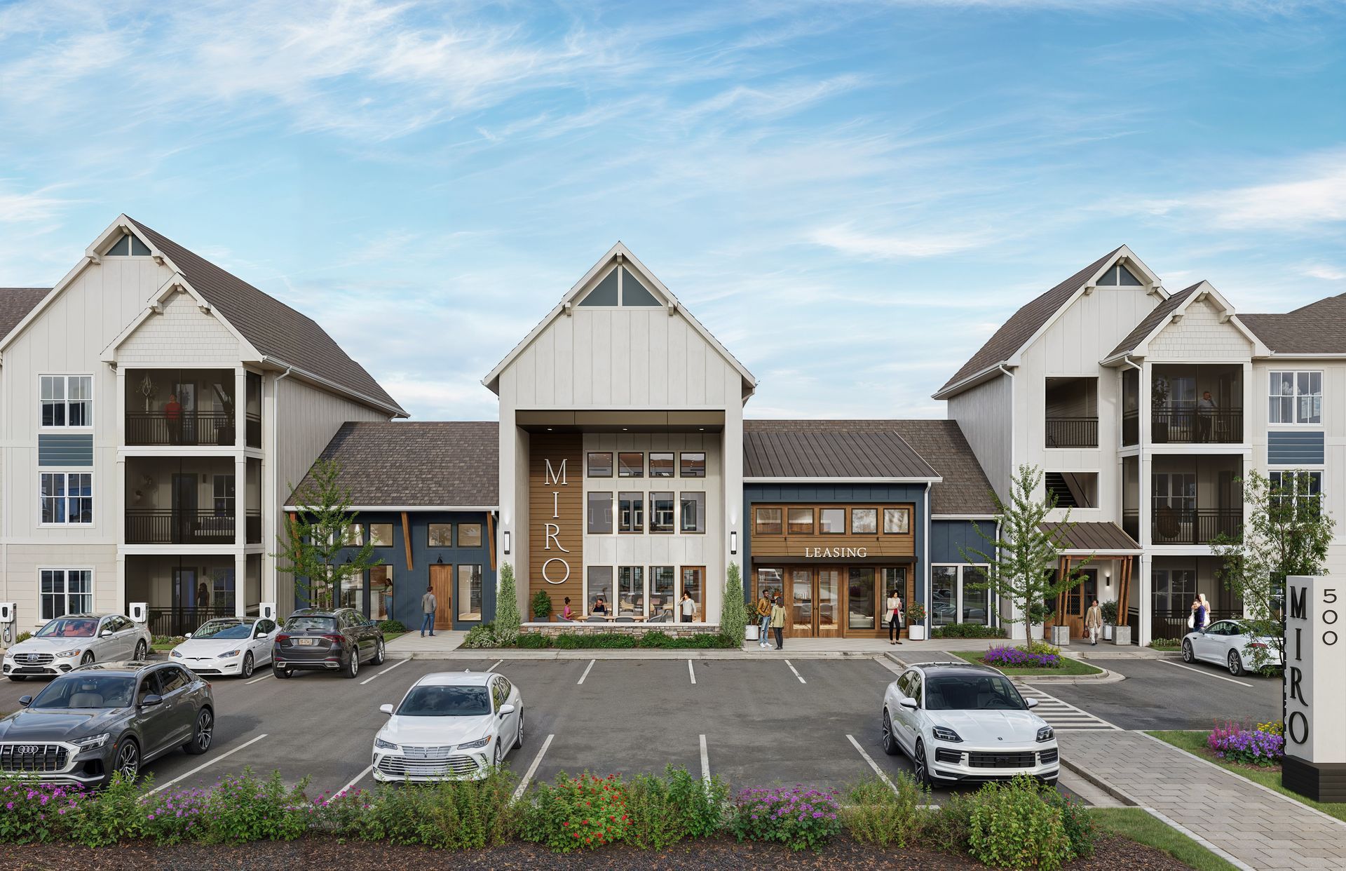 A bedroom with a large bed and a picture on the wall above it.