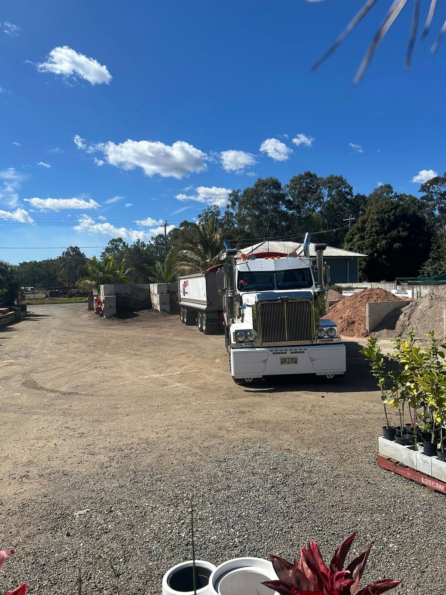 A Bunch of Tools Are Hanging on A Wall Including a Drill — Howard Hardware and Building Supplies in Howard, QLD
