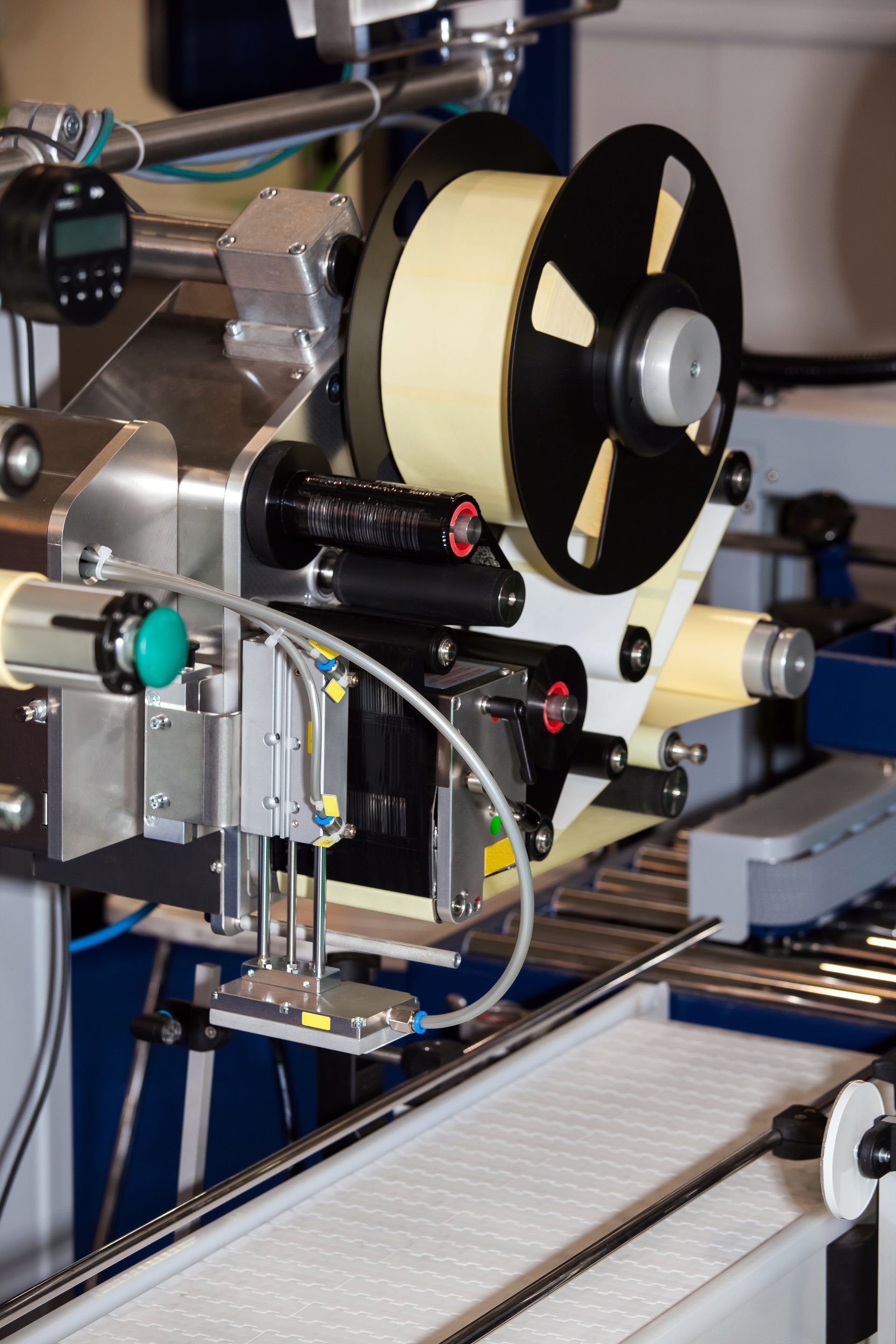 a machine that has a spool of labels on it