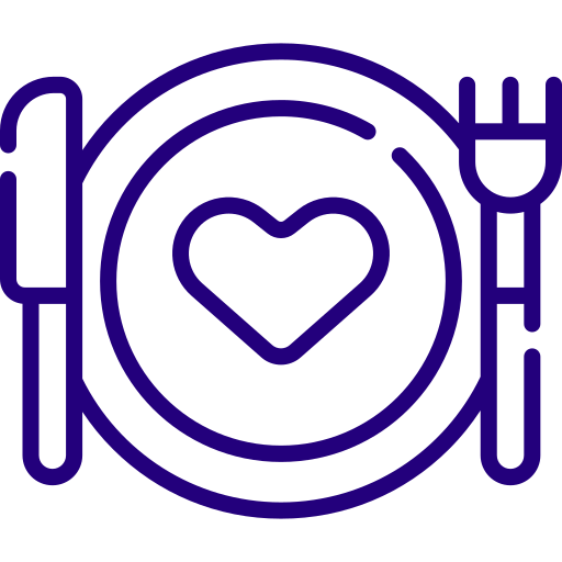 A plate with a heart in the middle of it and utensils.