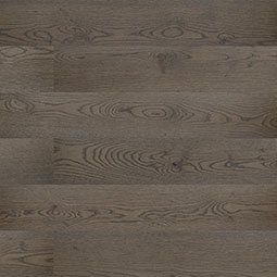 Dark gray wood flooring, with visible grain and knots.