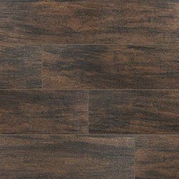 Dark brown wood-look floor tile with a textured surface.