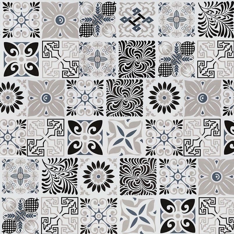 Patchwork of square tiles in neutral colors, each with a different floral or geometric pattern.